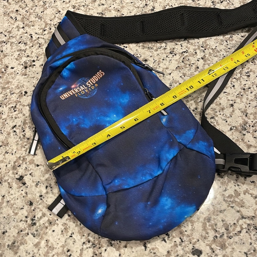 Universal Studios space dye blue sling bag with reflective strap unisex NWOT - Picture 10 of 11